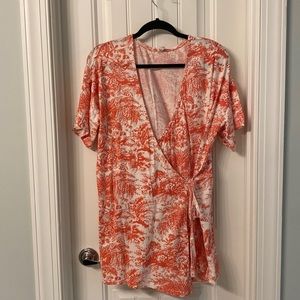 Orange and white Anthropologie wrap romper